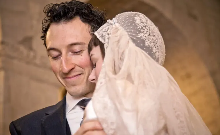Bride and groom embracing after the ceremony, photo Rosapaola Lucibelli