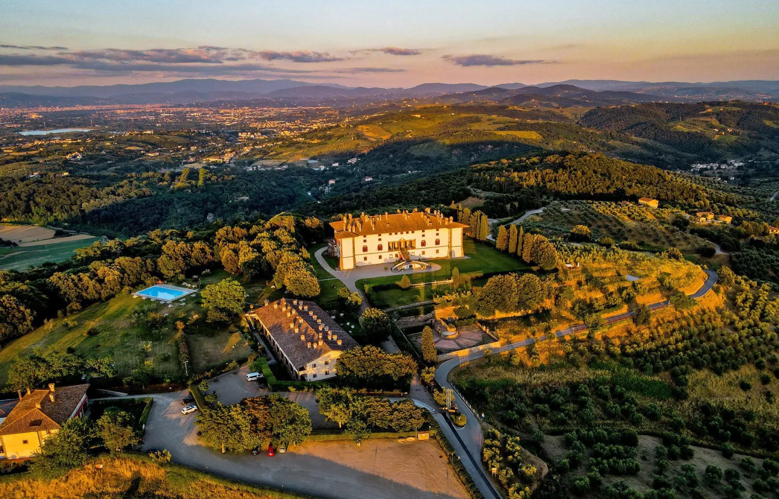 In the city, Aerial view of a Renaissance villa with its Italian garden in the hills near Florence