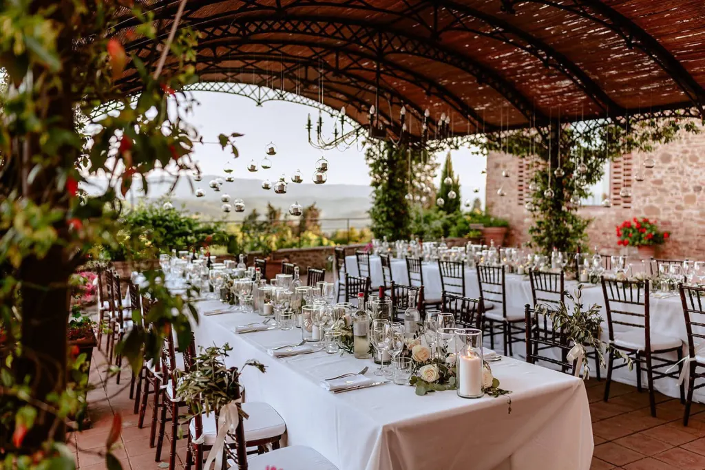 Chianti Wedding tables under the pergola of Villa Romance, Chianti