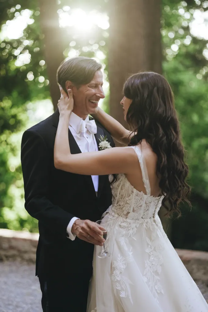 Photographers Bride and groom laughing together in a garden in Tuscany, photo Rellini Art Studio