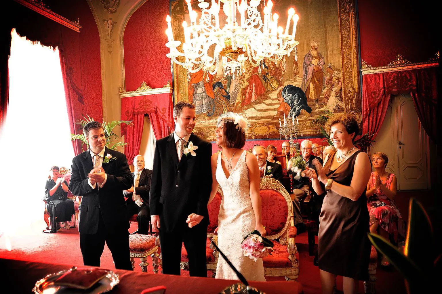 Palazzo Vecchio, Bride and groom smiling at the end of their civil ceremony in the Sala Rossa of Palazzo Vecchio in Florence