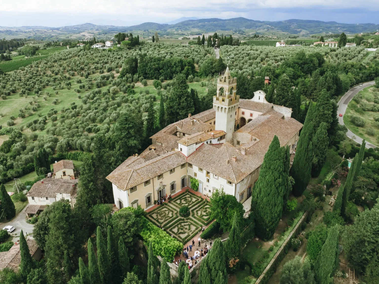 Three days Aerial view of Castello di Montegufoni among the Tuscan hills