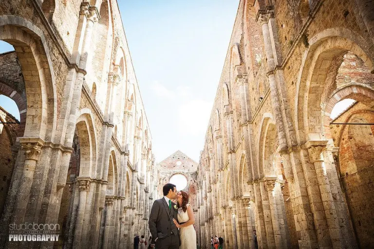 Wedding ceremony in the roofless abbey of San Galgano, Tuscany