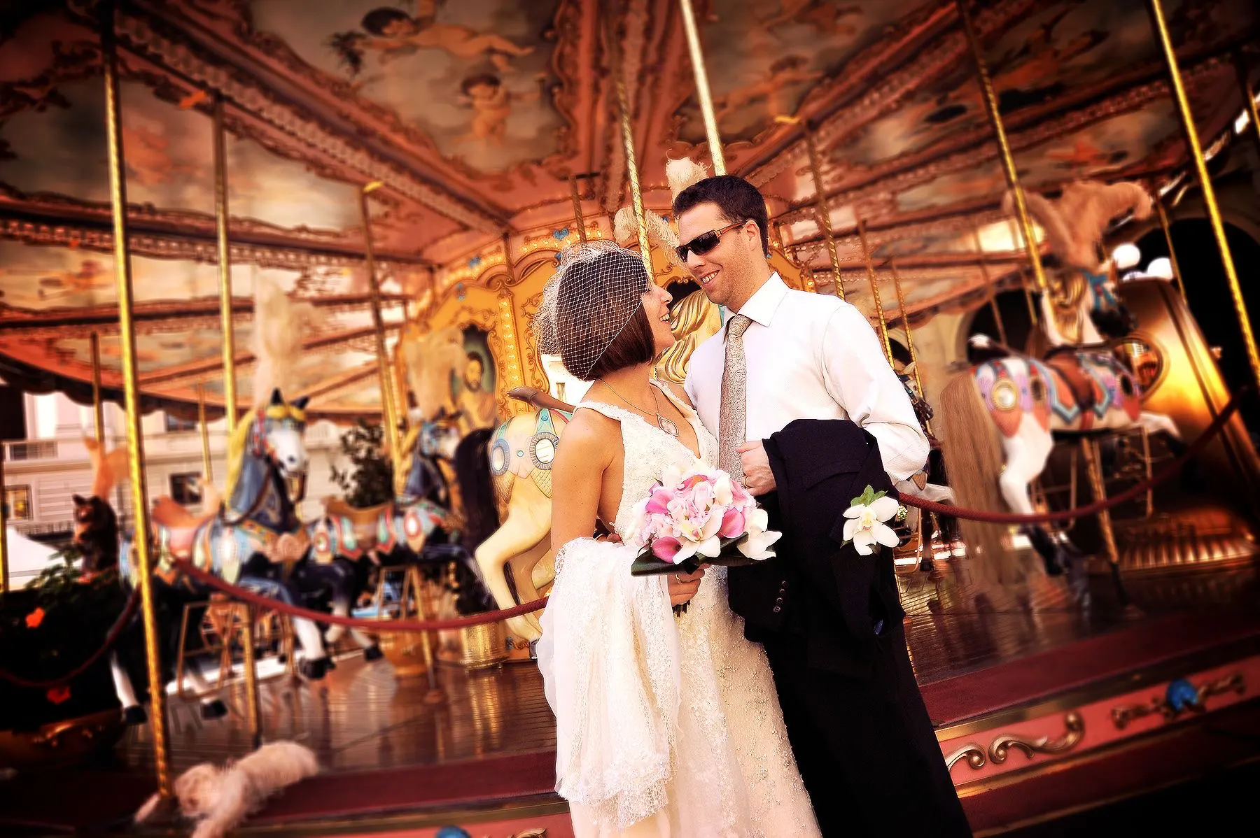 Bride and groom by the carousel in Piazza della Repubblica, Florence